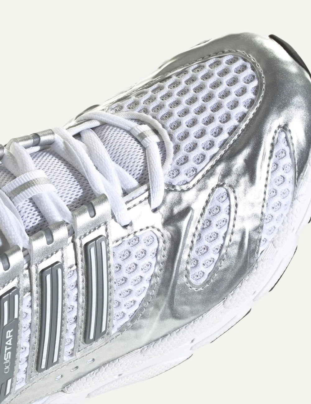 Women's adidas Originals Adistar MLD white and silver mesh sneakers with metallic overlays angled