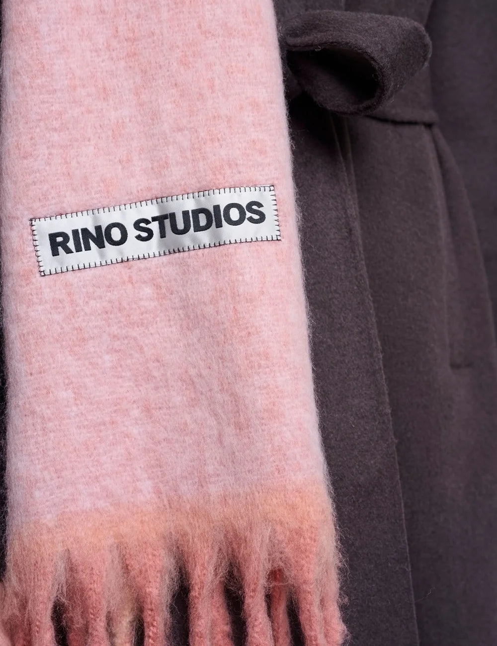 Rino Pelle women's soft pink oversized fluffy scarf with long fringes and Rino Studios logo patch detail