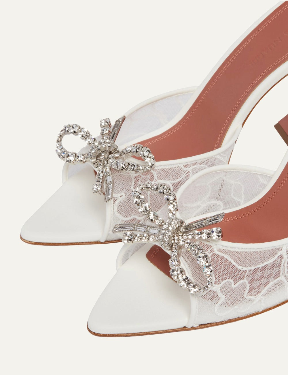 Amina Muaddi Rosie crystal bow lace mules white close-up