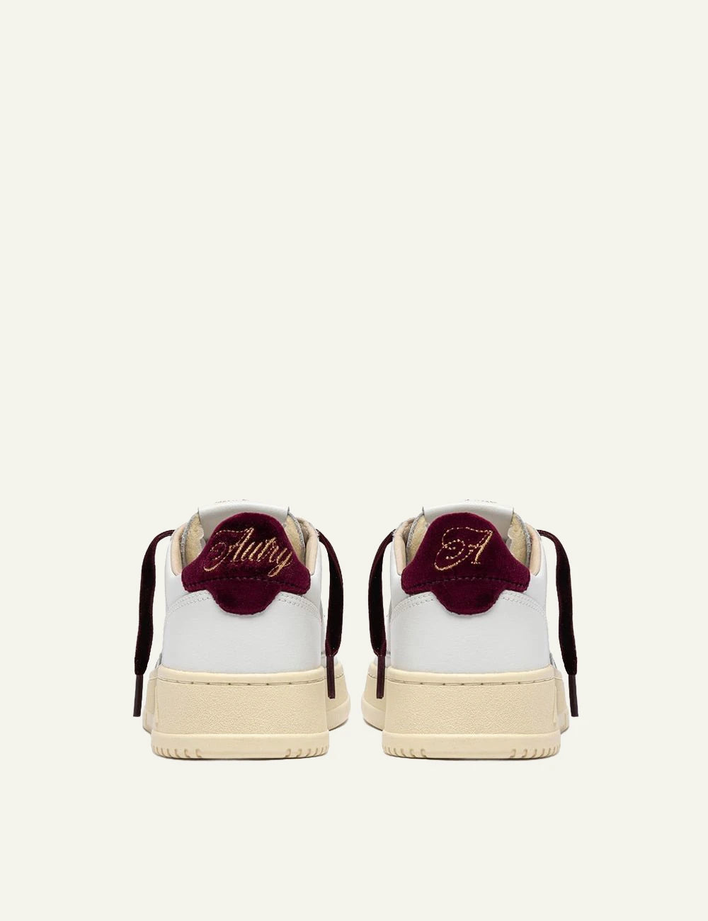 Autry women’s white leather sneakers with purple velvet details back