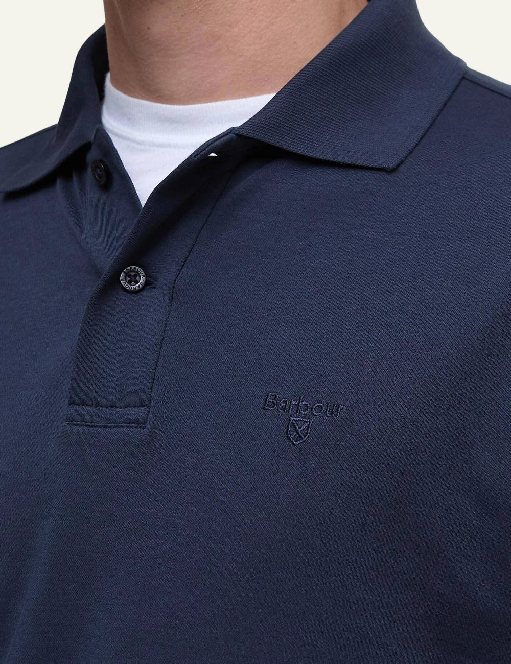 barbour navy polo shirt logo chest detail view