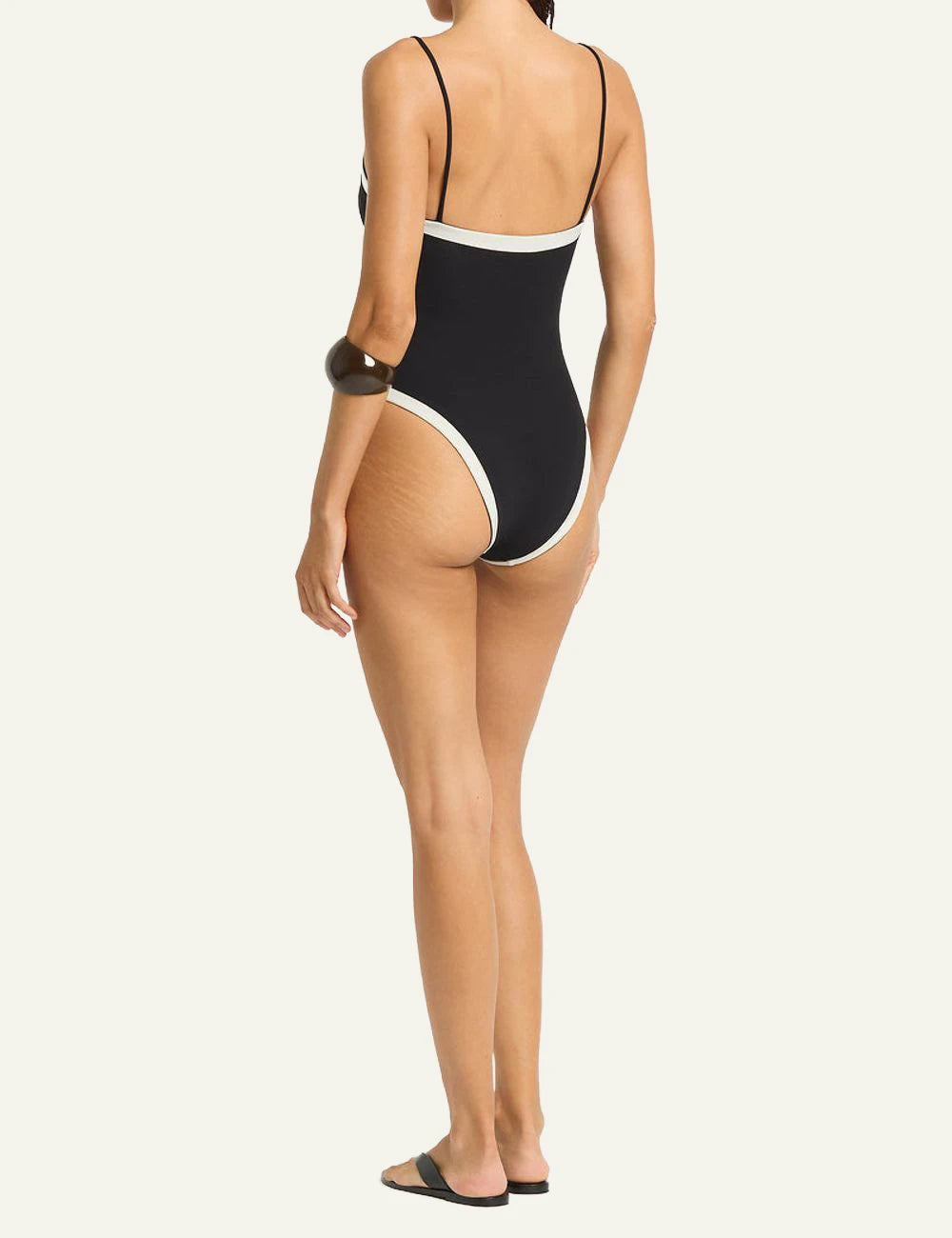 Bound reversible one piece black coconut back view