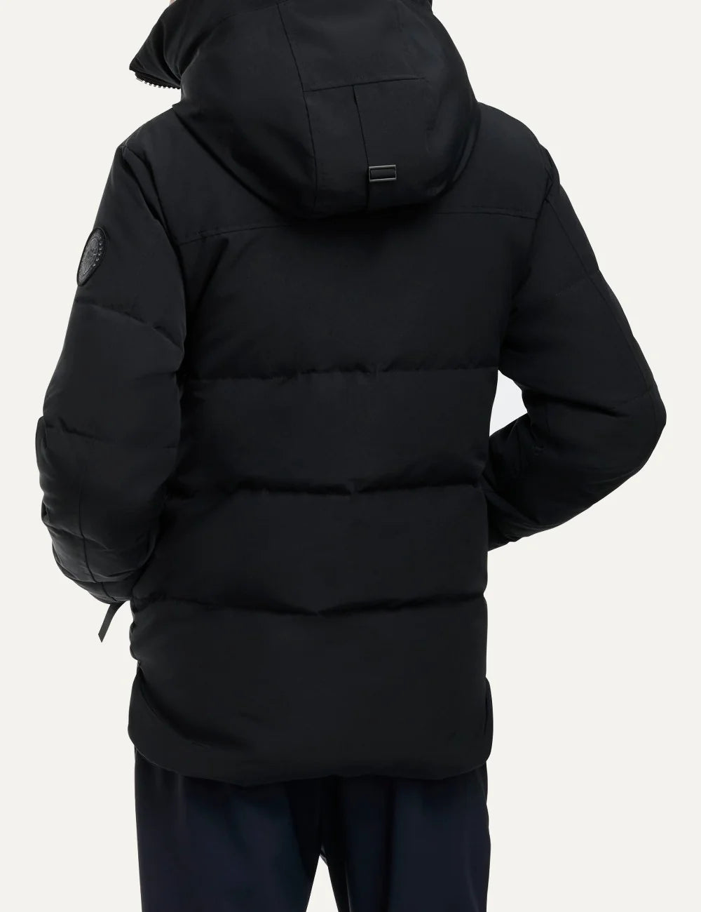 Canada Goose men's MacMillan Parka black down-filled quilted jacket with adjustable hood, two-way zipper, fleece-lined pockets and logo patch back