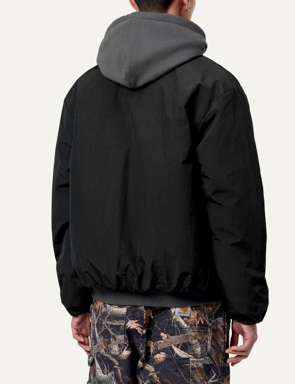 Carhartt WIP men Stanwood black water-repellent nylon jacket with chest zip pocket and logo label back
