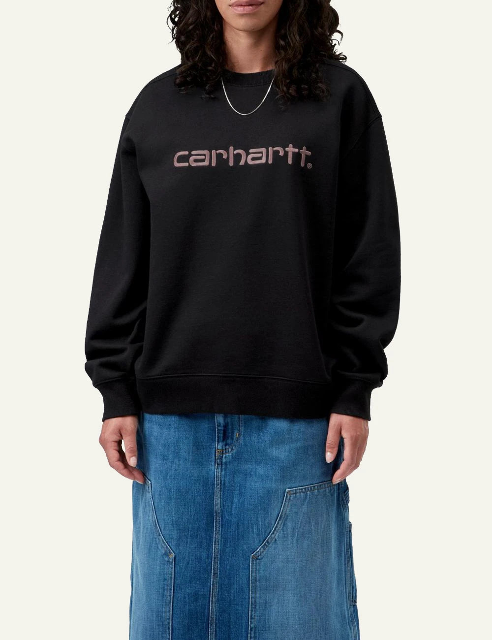 Women's Carhartt WIP black crewneck sweatshirt with pink embroidered script logo front view