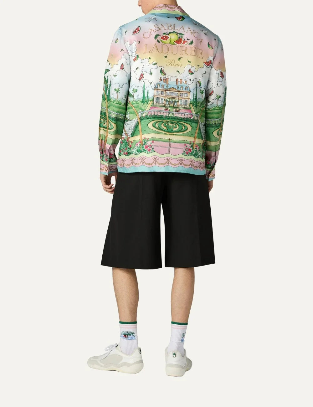Casablanca x Ladurée unisex multicolor silk satin long-sleeve shirt with pastel pink and blue borders, tropical garden print, palm trees, floral details and Cuban collar back deail