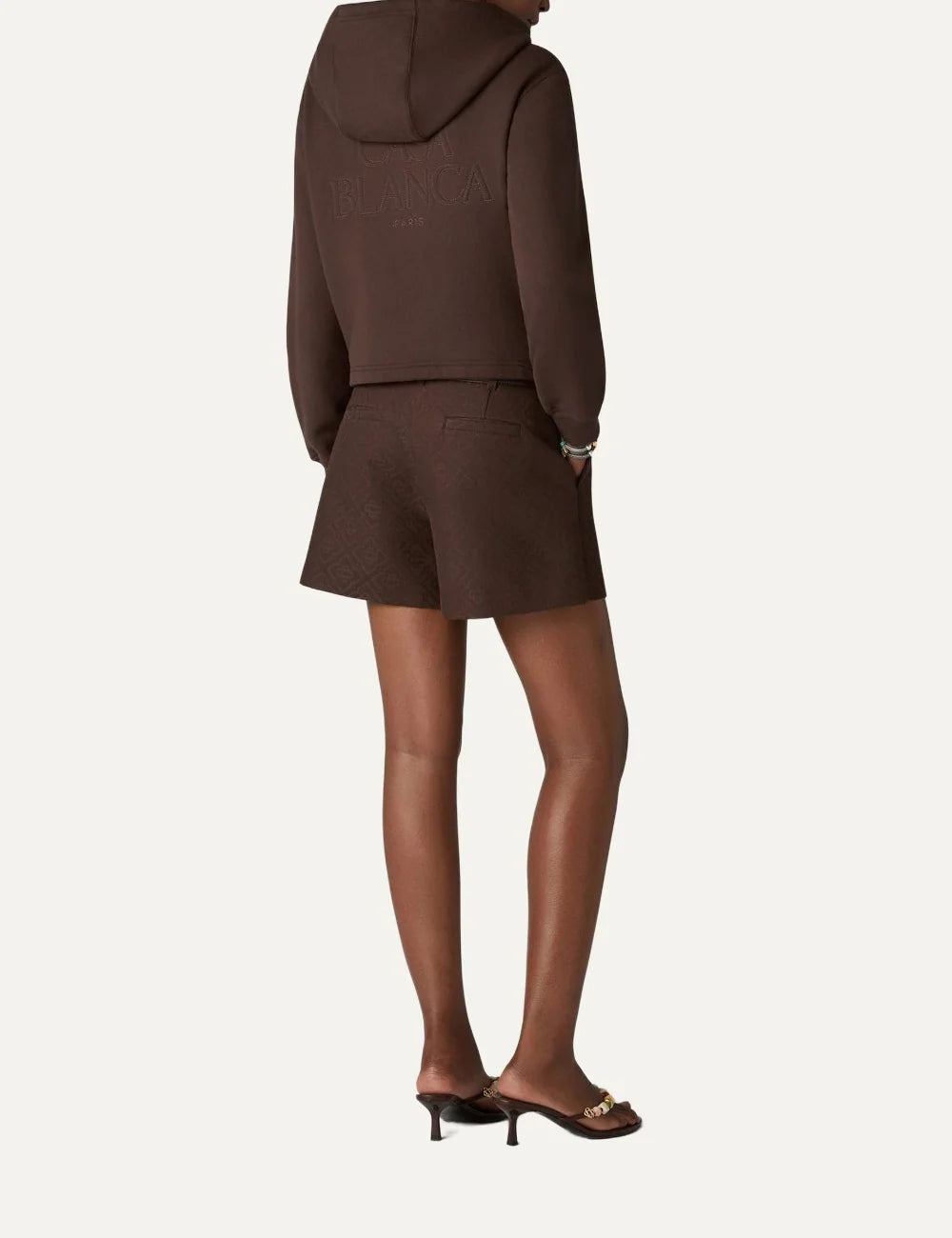Casablanca women's dark brown cropped zip-up hoodie with tonal chest logo, beaded drawstrings, side pockets and ribbed cuffs back