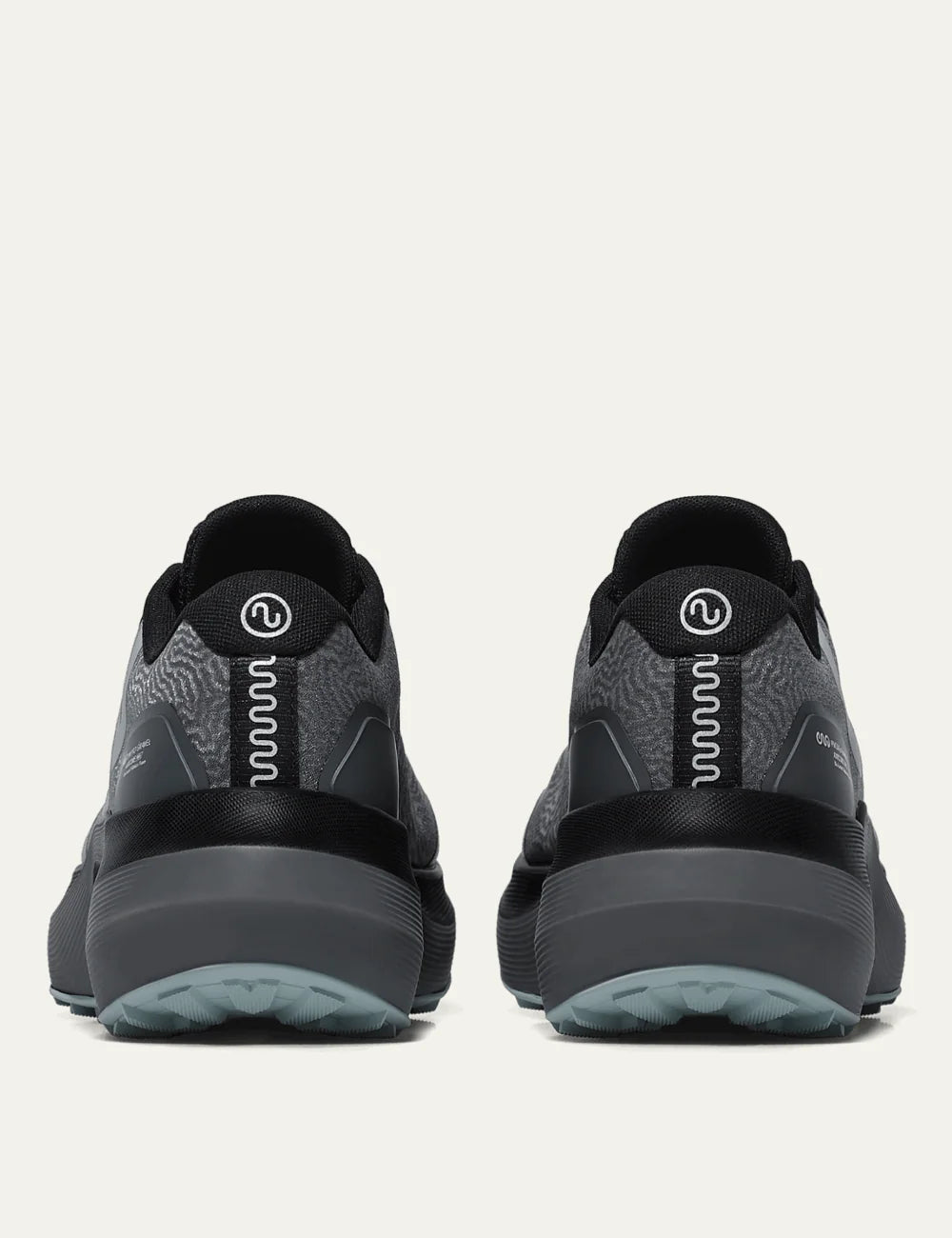 Ena Proto Gravel sneakers grey black hybrid sole back view.