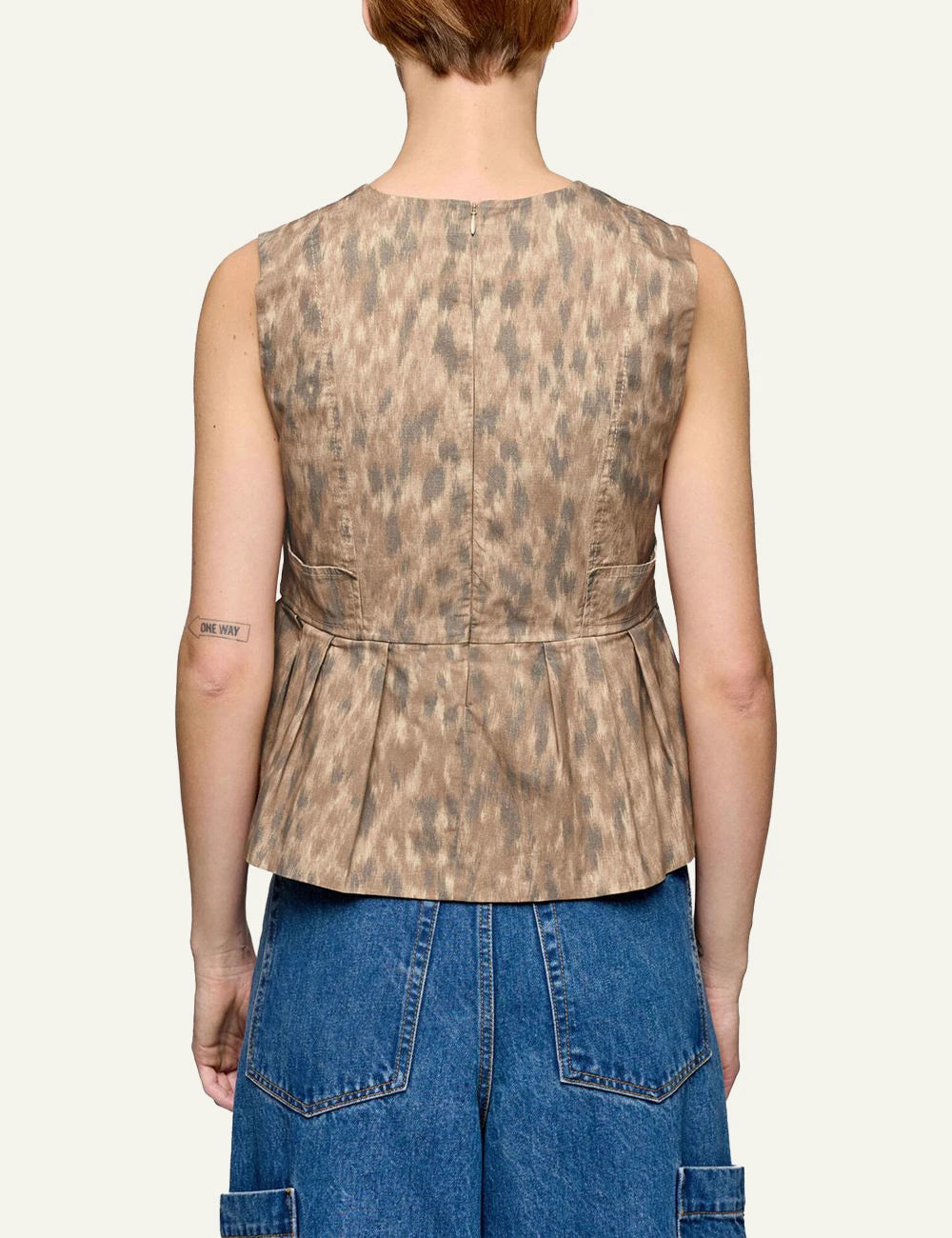 Ganni sleeveless top animal print with pleated hem back view