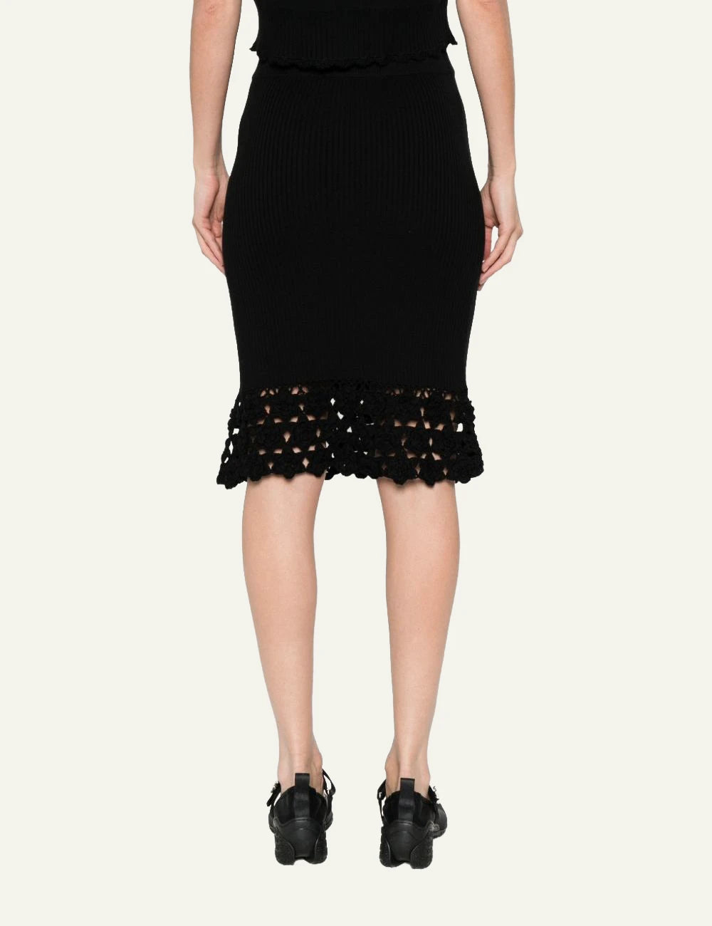 Ganni rib crochet skirt black midi knit hem detail back view