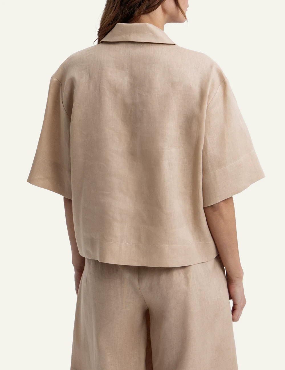 Greek Archaic Kori beige short sleeve shirt back view