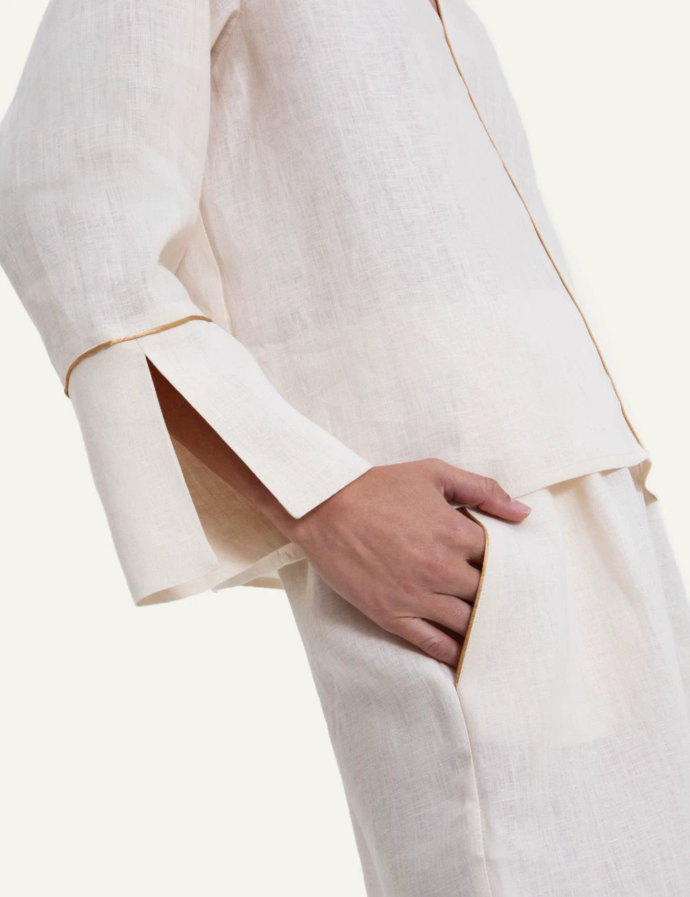 Greek Archaic Kori ecru long sleeve blouse V neck side detail view