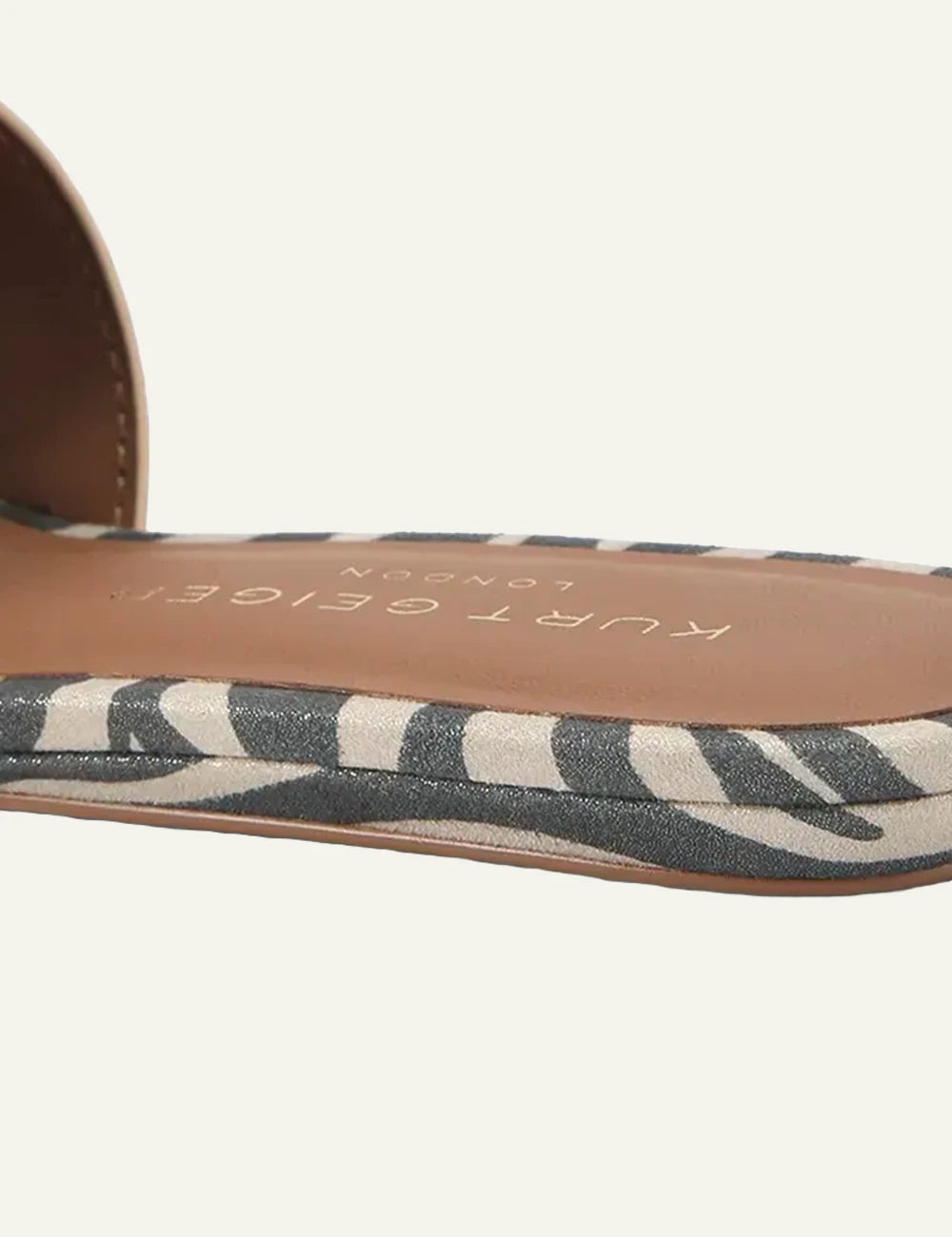 Kurt Geiger Kensington flat flip flop beige leather zebra sole eagle logo side detail view
