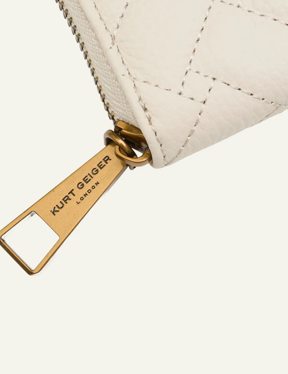 kurt geiger quilted wallet beige zip around detail zip view