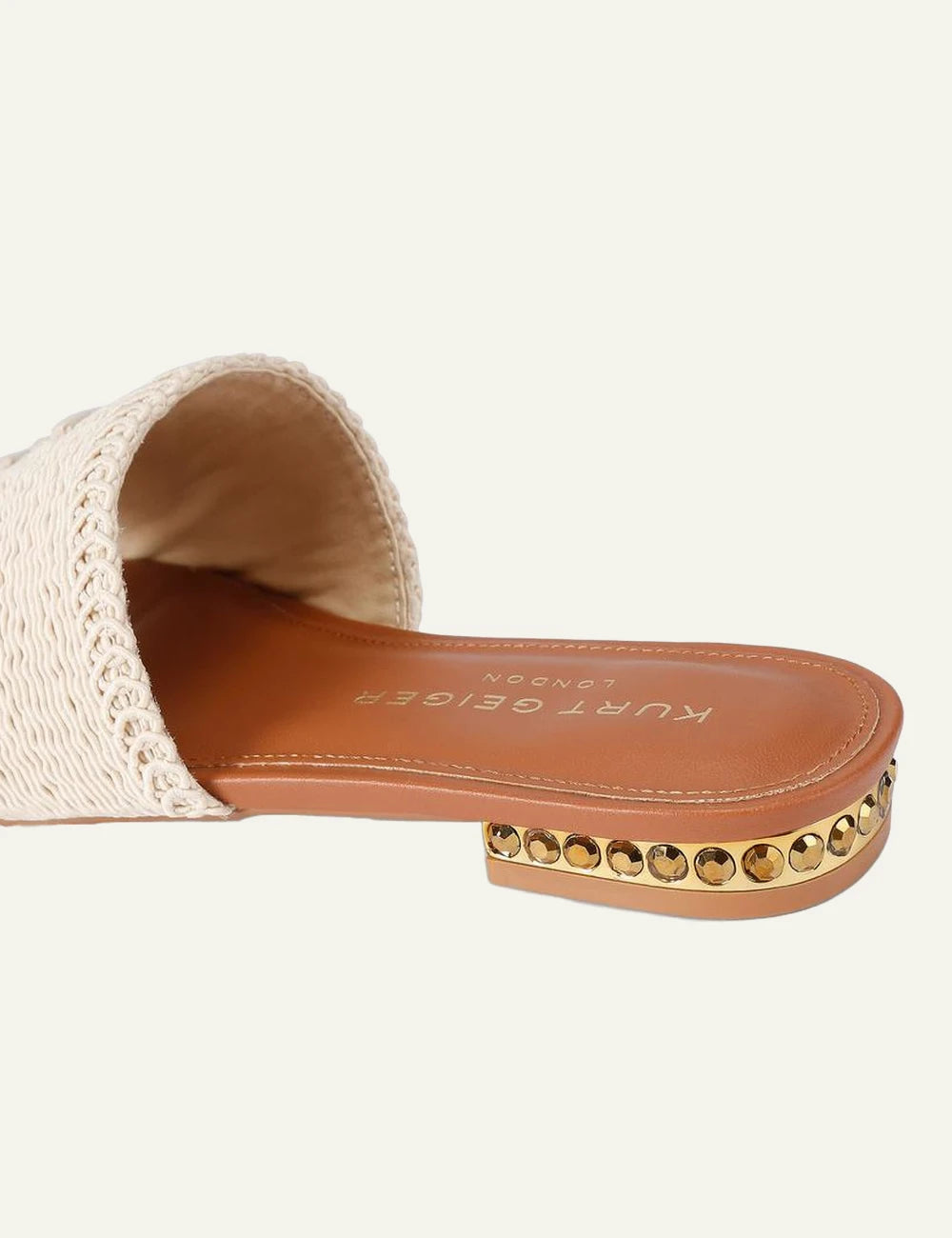 Kurt Geiger woven flat sandal beige fabric embroidered logo gold crystal heel back view