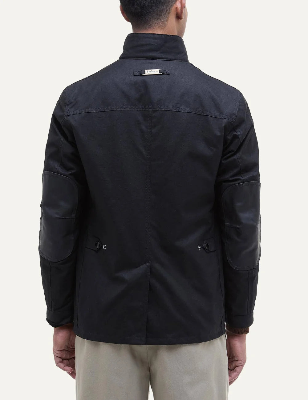 Men's Barbour Ogston black heavyweight waxed cotton jacket with quilted inner vest, stand collar, four utility pockets and leather elbow patches back view
