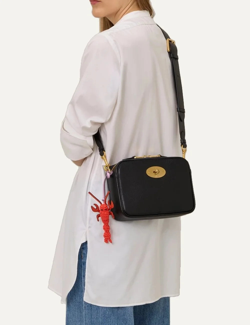 Mulberry British Summer lobster bag charm in coral red with a woven body, leather claws and lilac hanging strap model