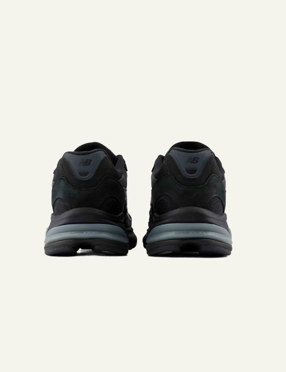 New Balance 2010 men's black mesh and suede sneakers with dark green details back view