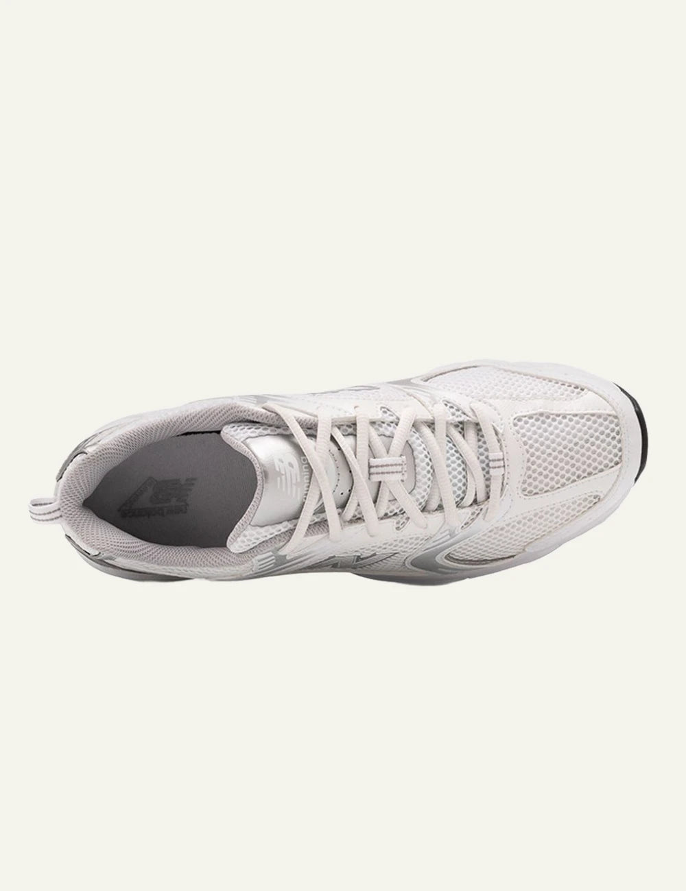 New Balance 530 women's white mesh sneakers with silver details top view