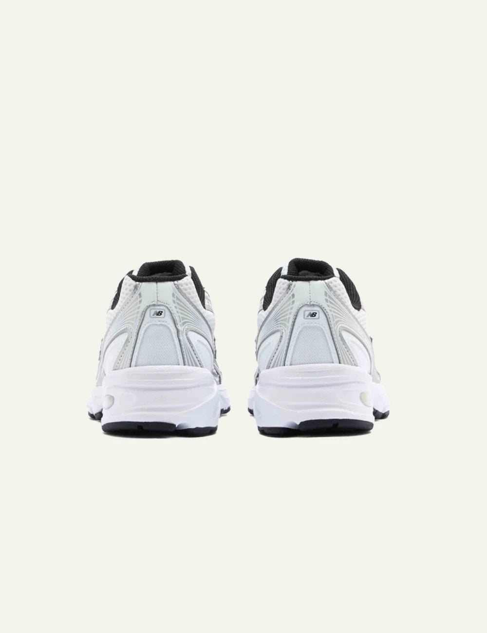 New Balance 740 women's white mesh sneakers with silver and black details back view