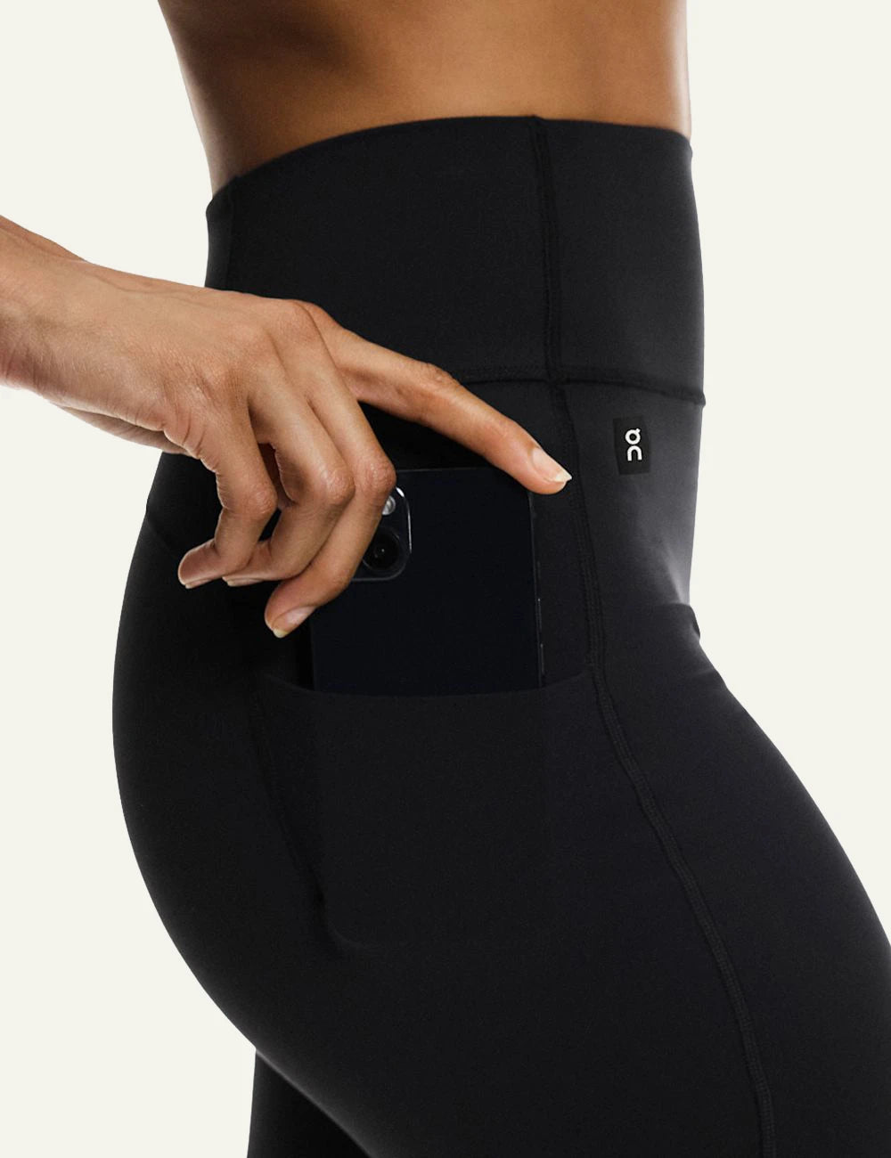 On biker shorts black pocket detail with phone