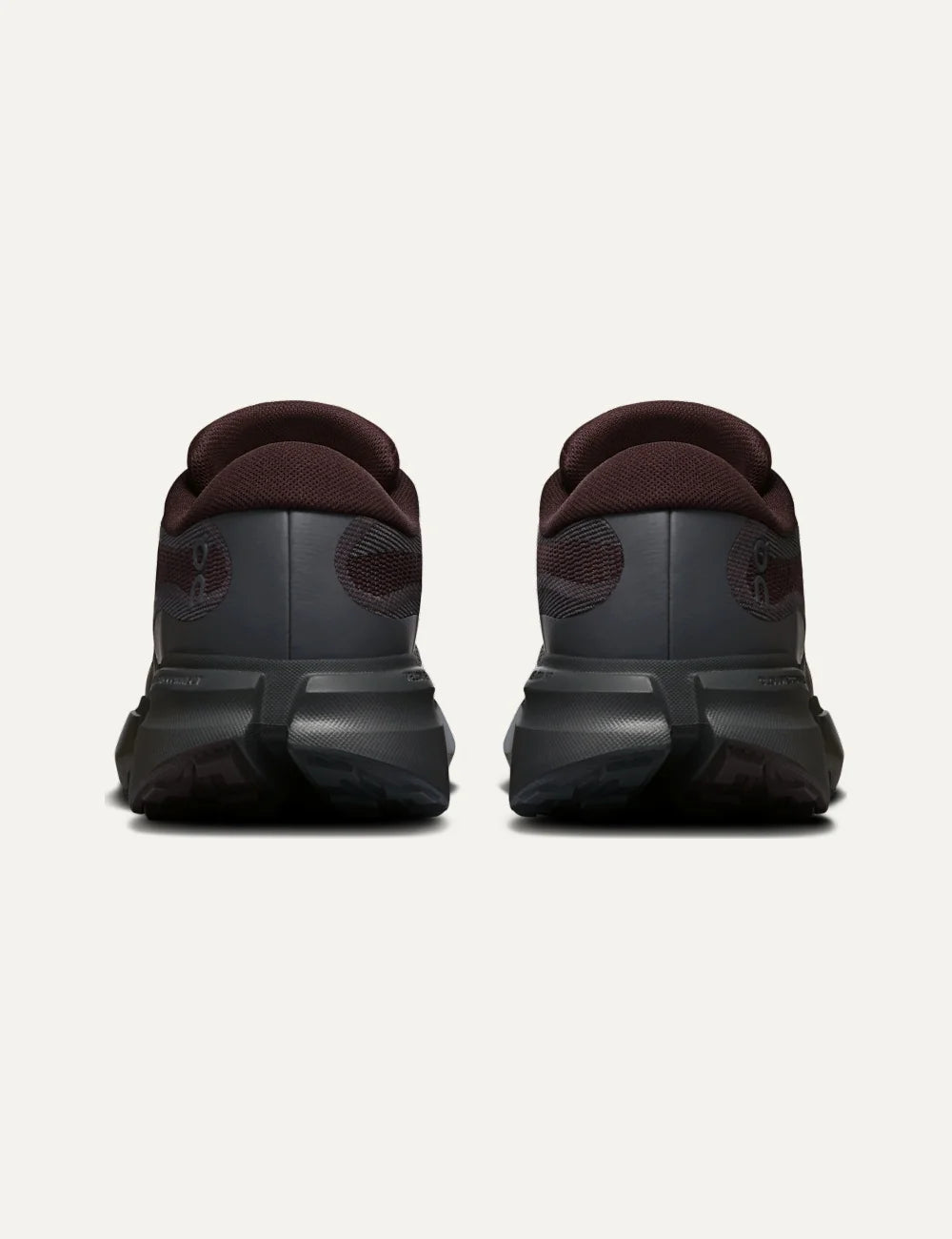 On men's burgundy and dark grey hiking sneakers with mesh upper, CloudTec Connect cushioning and Missiongrip outsole back