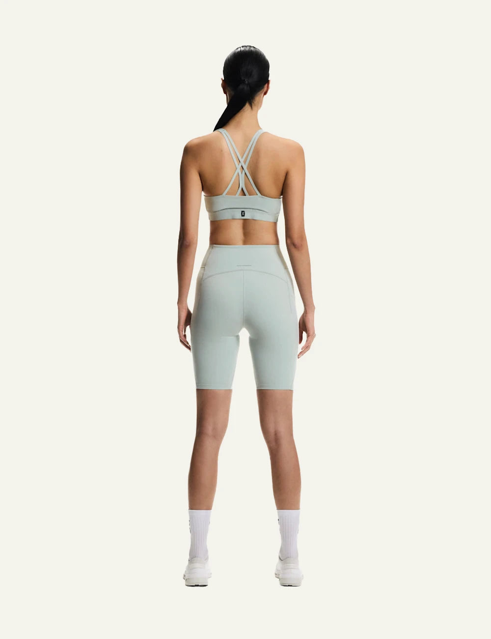 On studio bra mineral light support seamless racerback back model view