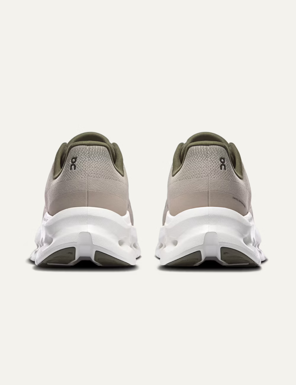 On women's beige mesh sneakers with olive details and CloudTec Phase sole back