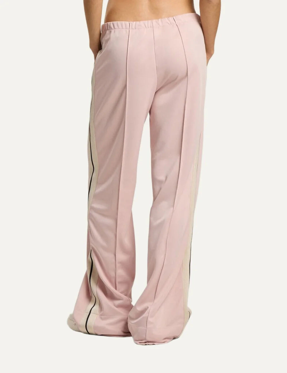 Palm Angels women's light pink wide leg track pants with black and white side stripes, elastic waistband, front pintuck pleats and embroidered logo back