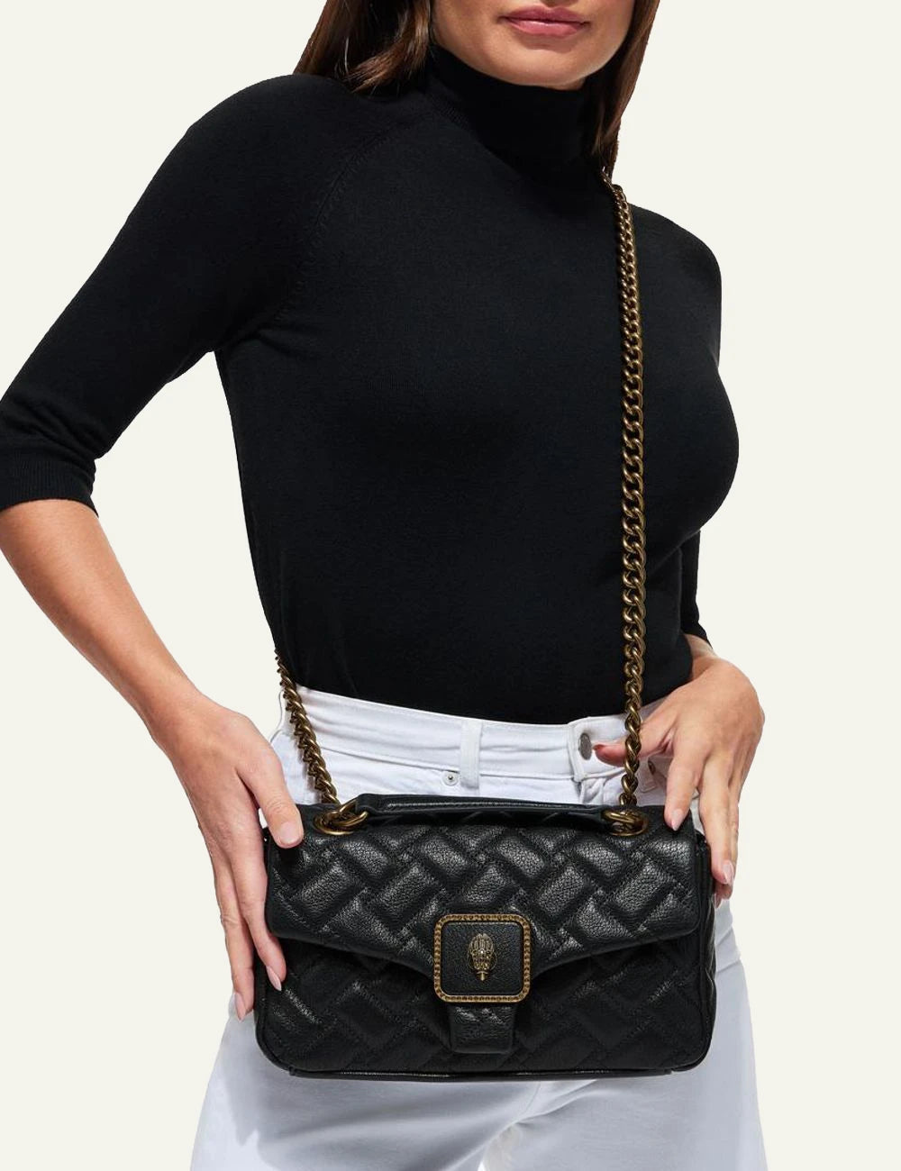 Kurt Geiger Pimlico quilted leather bag with gold chain strap eorn cross body by model