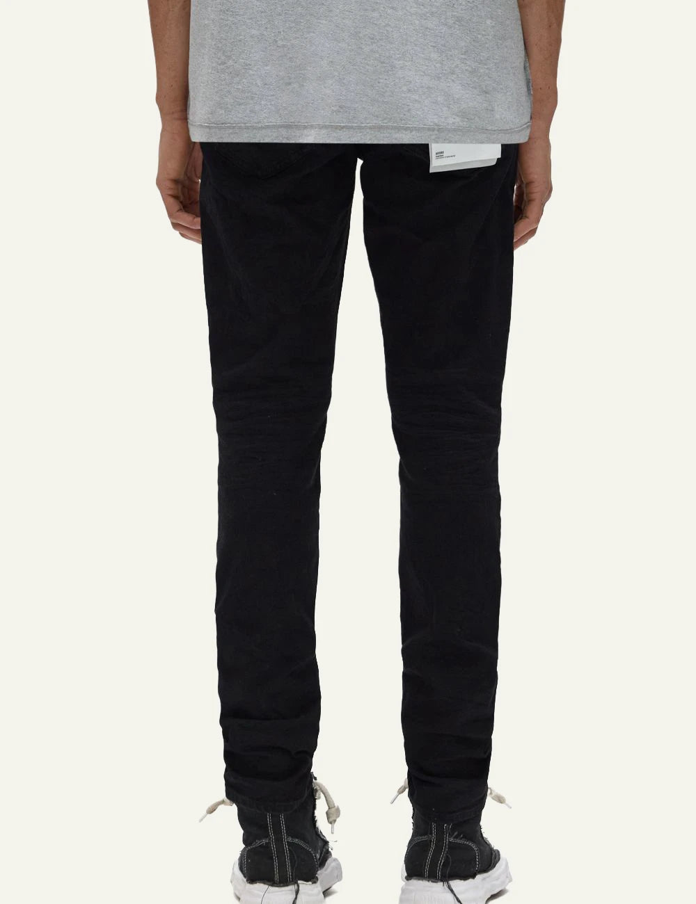 Purple Brand black slim fit stretch jeans with distressed detail back view