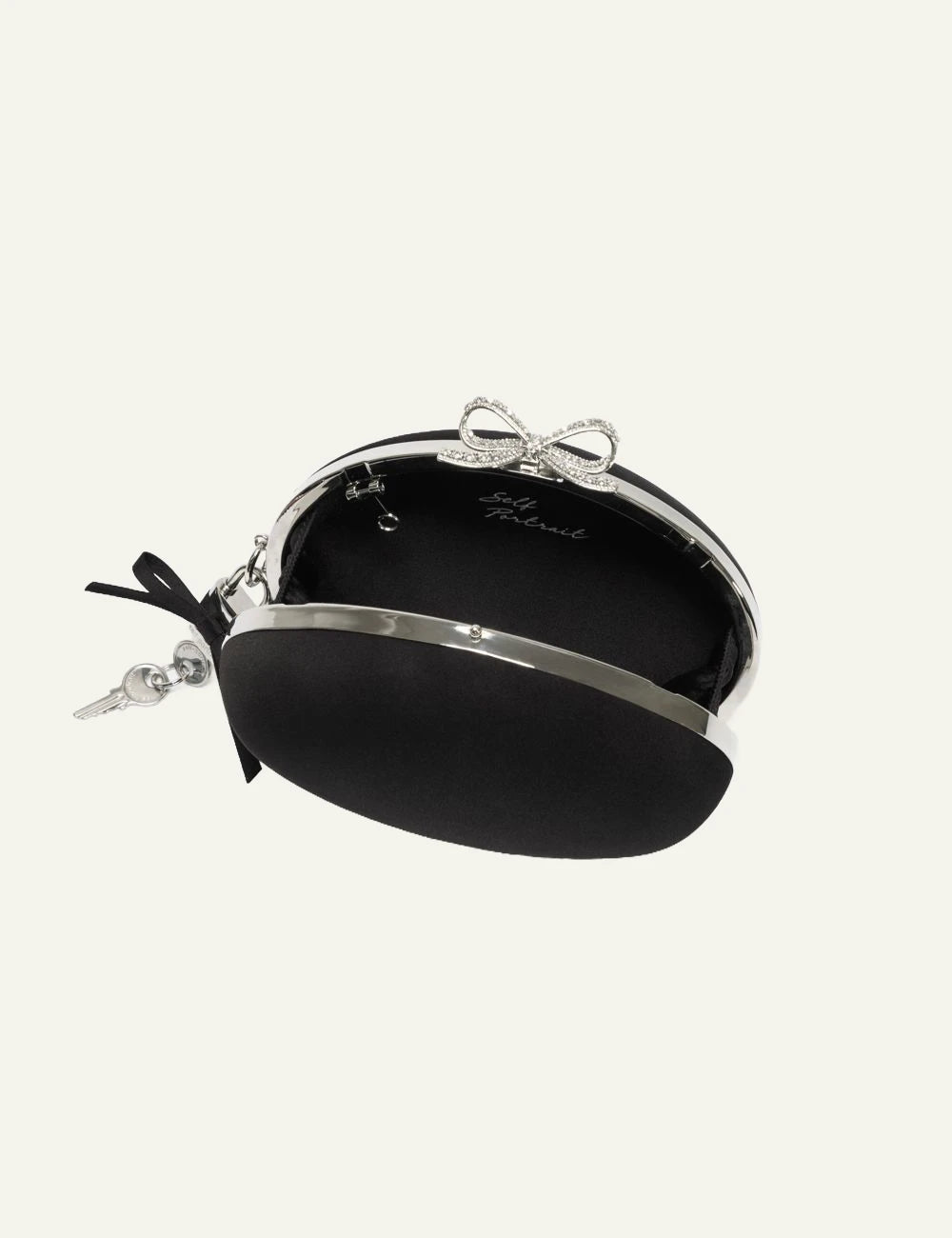 Self-Portrait black satin oval clutch interior