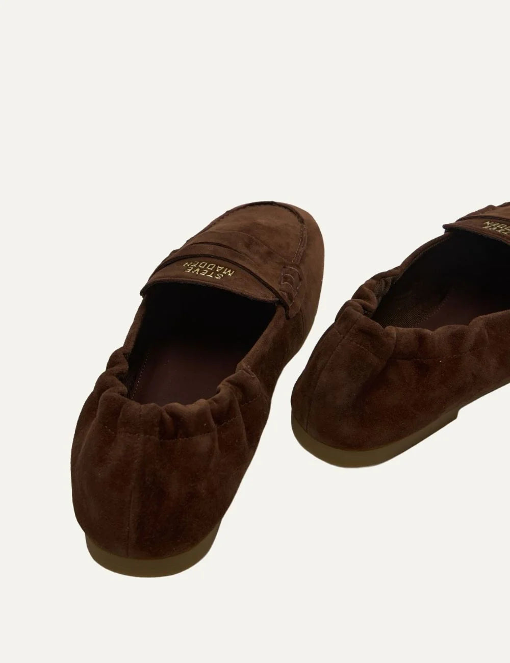 Steve Madden Newbury women's dark chocolate brown suede loafers with decorative penny strap, gathered heel, rounded toe and flat rubber sole back view
