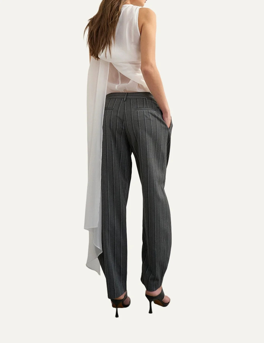 Topshop women's dark grey pinstripe straight-leg trousers with front pleats and button details at the hems back