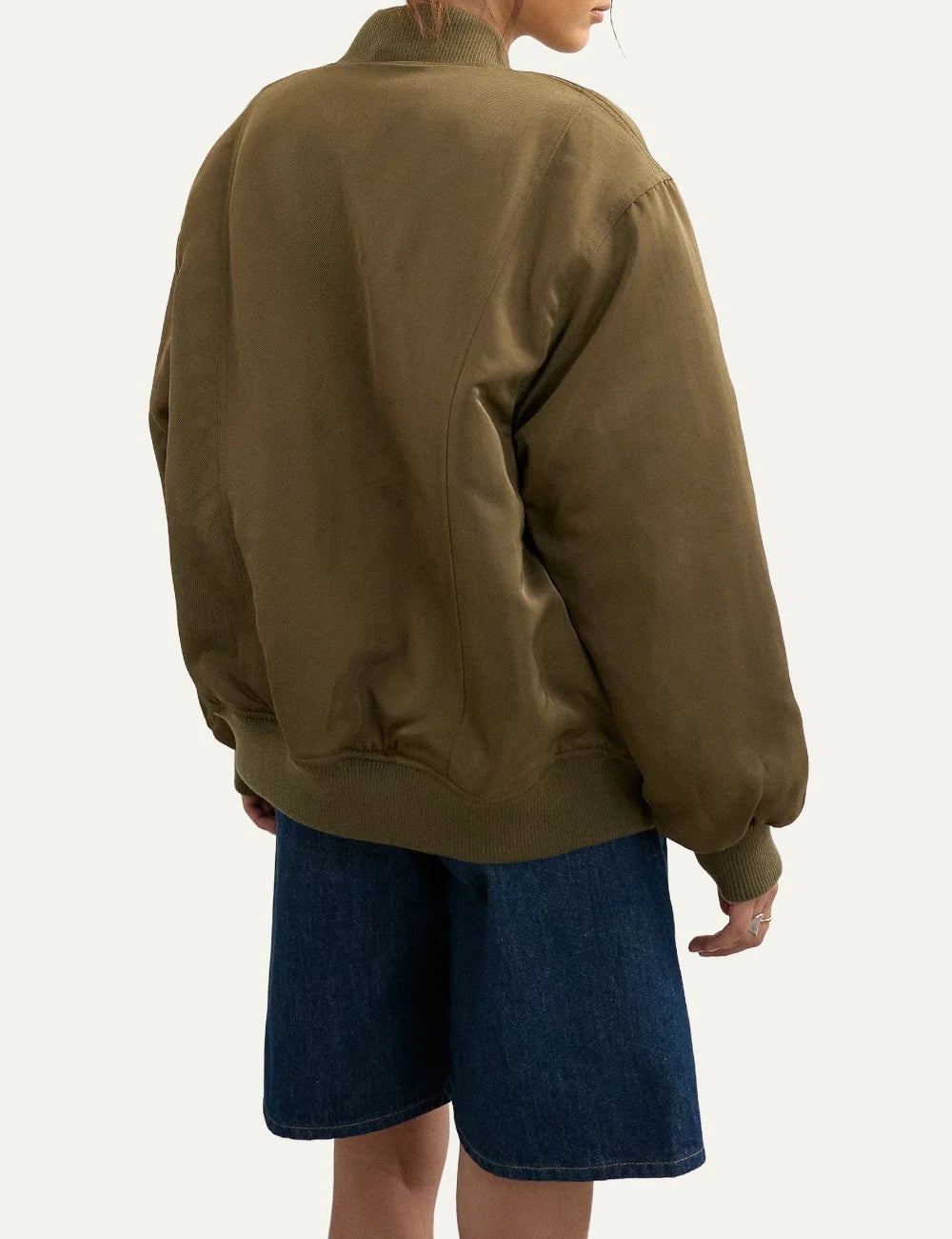Topshop women's olive green oversized bomber jacket with ribbed collar, front zipper and sleeve zip pocket back