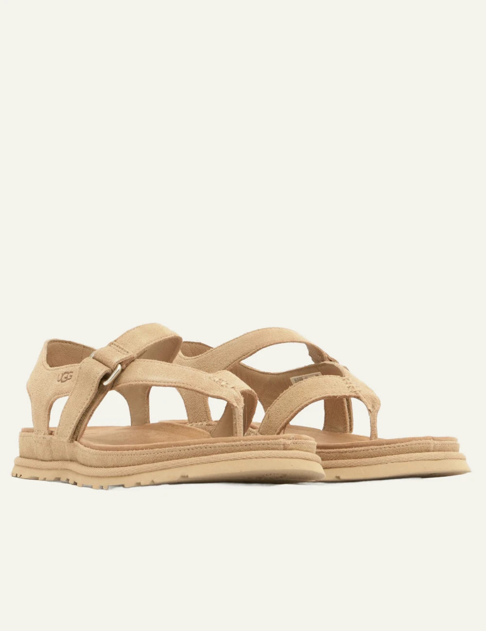 ugg suede sandal sand cross strap flat angled view