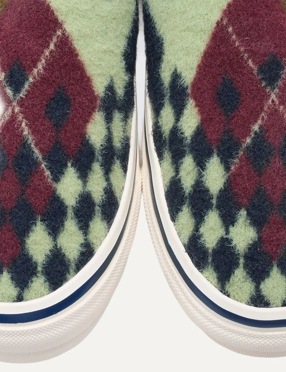 Vans LX Classic Slip-On 98 men's multicolor sneakers with textured wool-effect upper in burgundy, navy, brown and cream geometric patterns, elastic side panels and white rubber sole detail