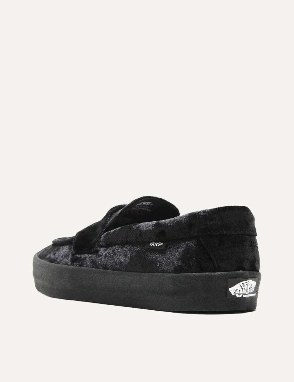 Vans Skate Loafer men's black velvet slip-on sneakers with classic loafer strap, low-profile silhouette and black vulcanized rubber waffle sole back-side view