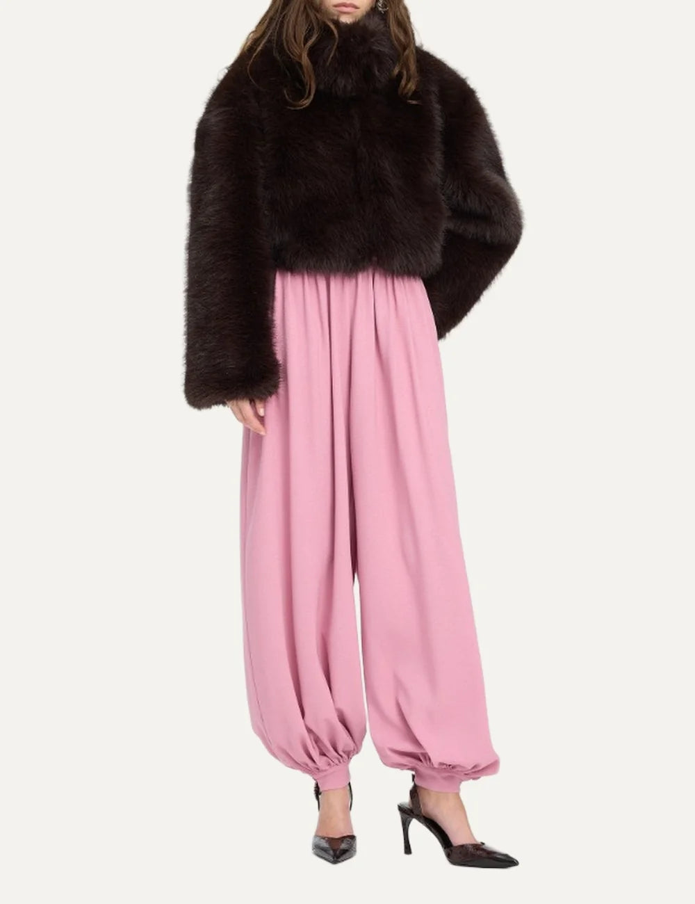 Women's dark brown cropped faux fur jacket with a high collar, long sleeves, subtle sheen and concealed front closure. full body