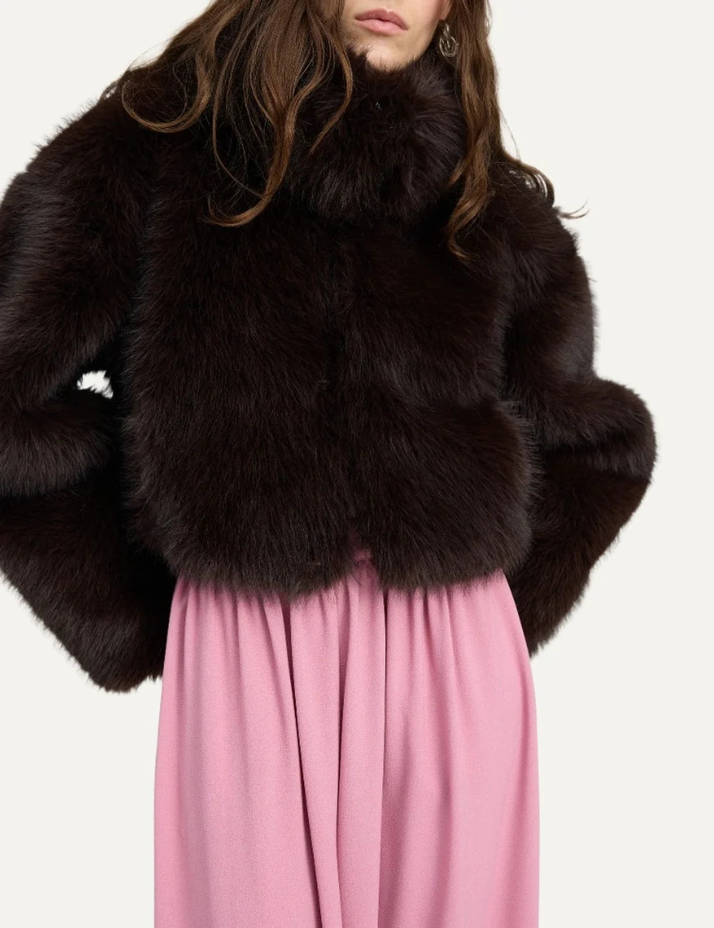 Women's dark brown cropped faux fur jacket with a high collar, long sleeves, subtle sheen and concealed front closure. detail