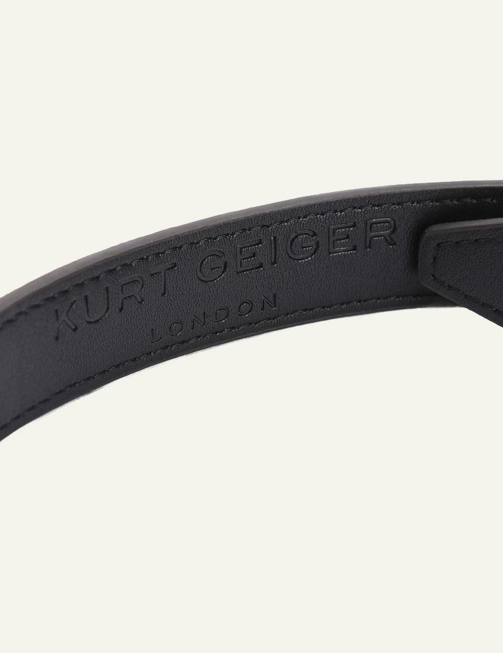 Kurt Geiger London fabric belt with eagle buckle gold front view