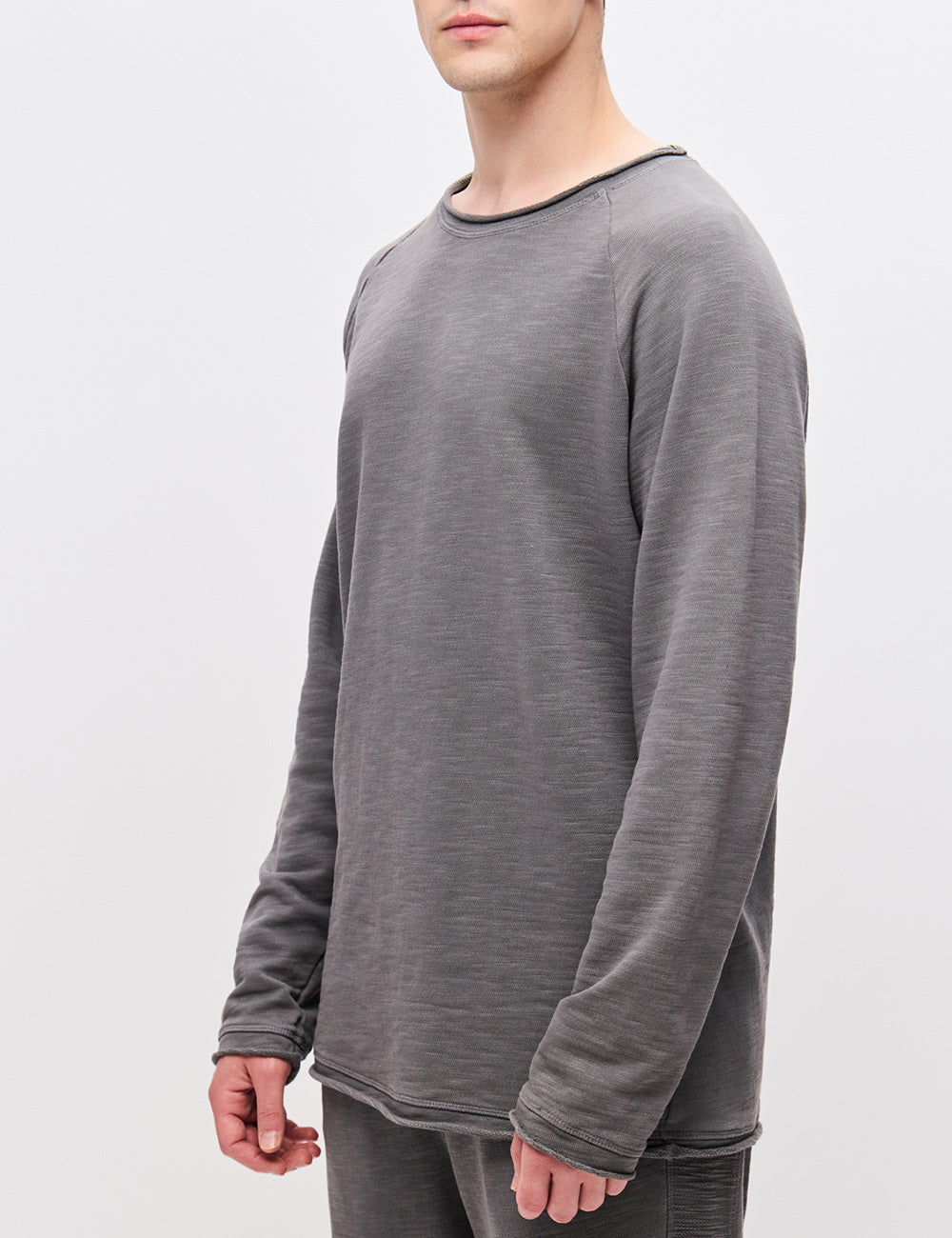 DIRTY LAUNDRY RAGLAN CREWNECK WITH RAW EDGES