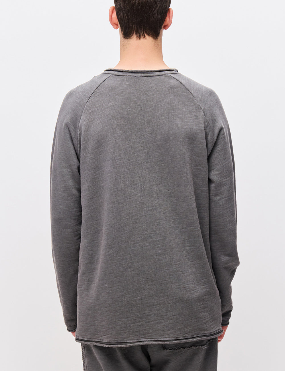 DIRTY LAUNDRY RAGLAN CREWNECK WITH RAW EDGES