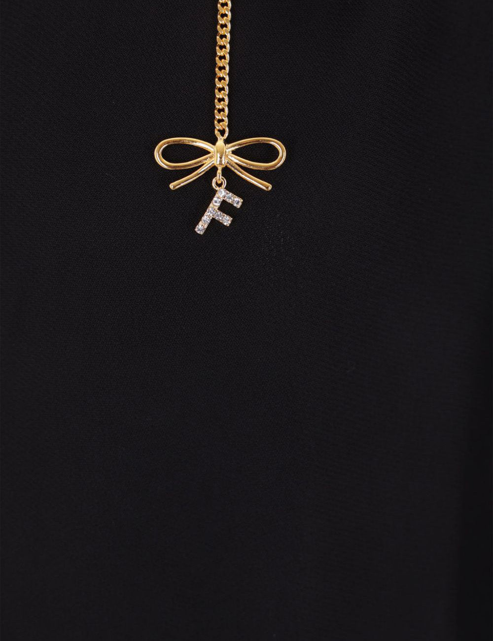 ELISABETTA FRANCHI Blouse in georgette fabric with charms and logo