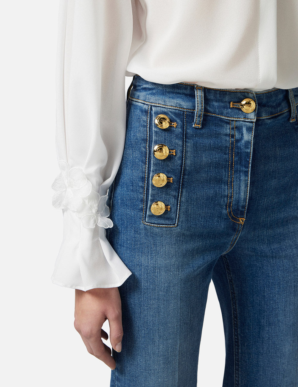 ELISABETTA FRANCHI Bell-bottom jeans with row of buttons