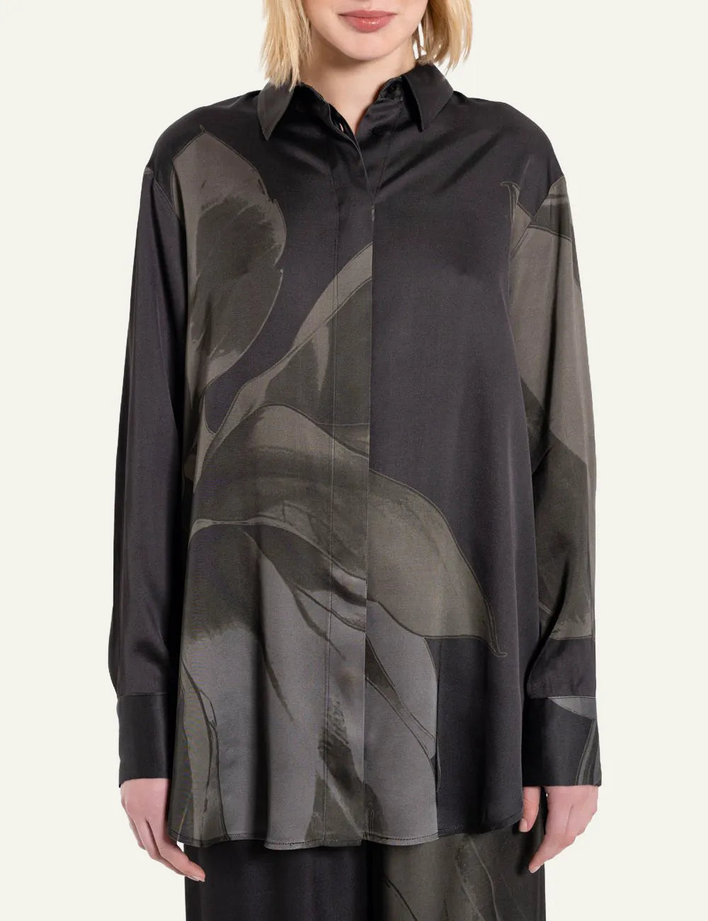 Philosophy semi-sheer black floral printed shirt with waist tie, button closure and long sleeves view on model