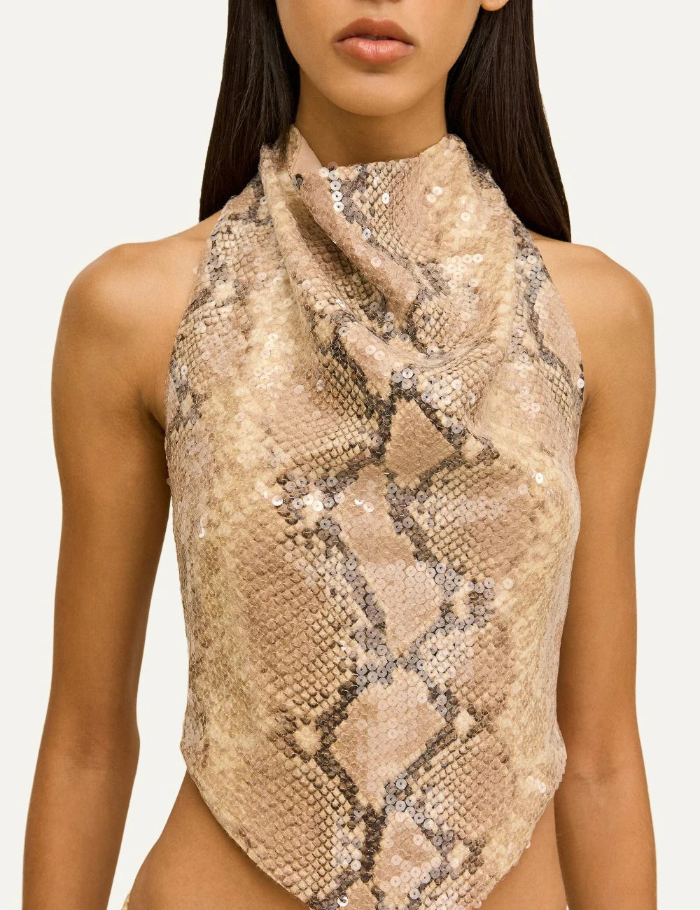 Cult Gaia Dionea beige python print silk crepe sequin top with draped high neckline, sleeveless design and pointed handkerchief hem model