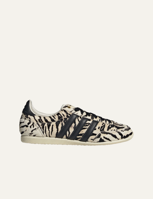 Women’s Adidas Japan W pony-hair sneakers with beige and black animal print and signature three stripes.