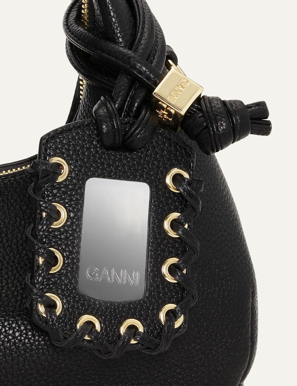 ganni hobo mini grained black bag close-up with logo tag