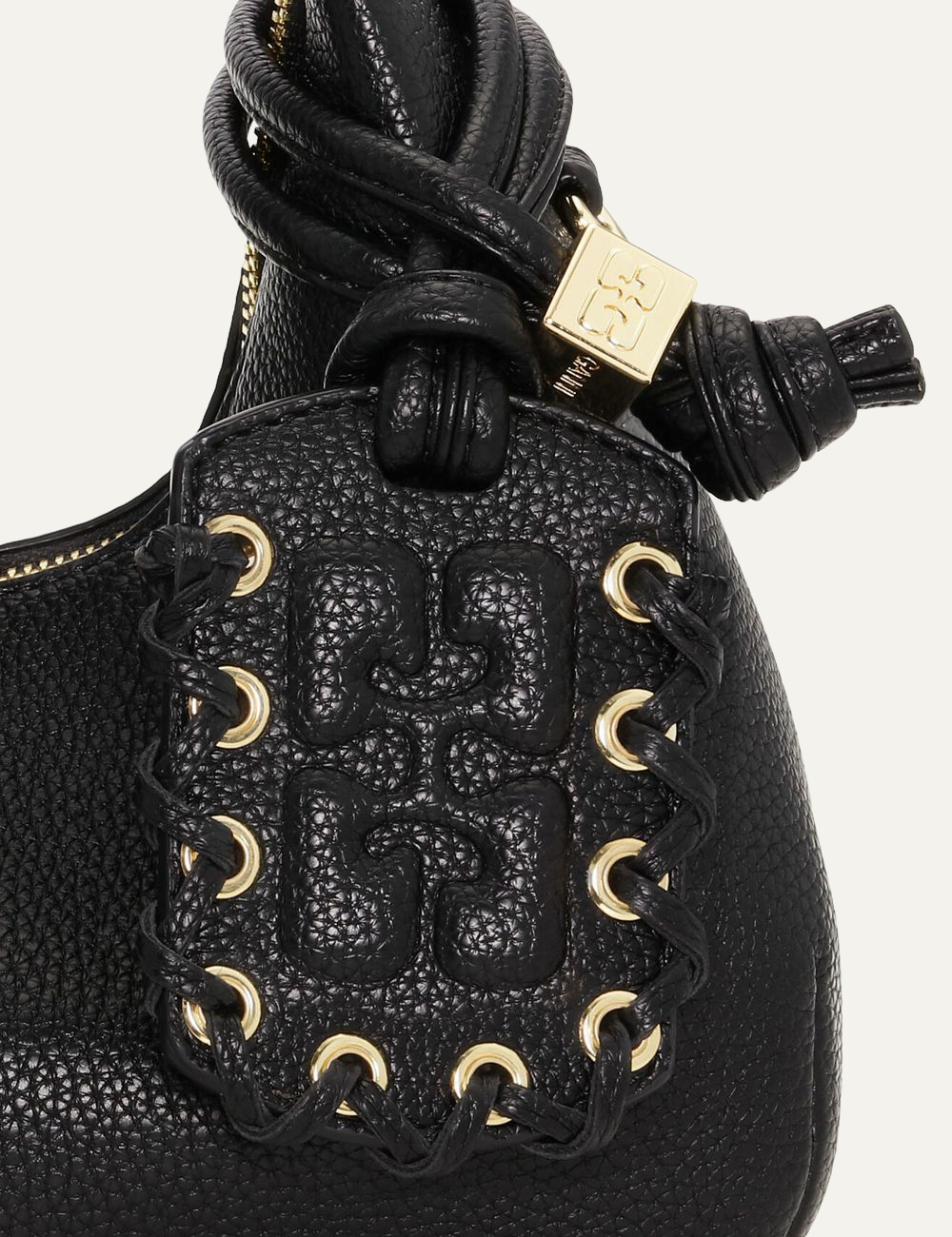 ganni hobo mini grained black bag braided tag detail